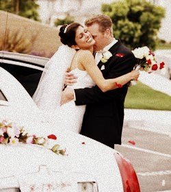 Image of couple standing by a CT Limo