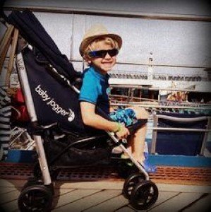 Image of child in stroller going on vacation with Limousines of Connecticut